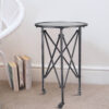 27 Inch Side Table, Round Metal Body, Glass Tabletop, 3 Wheels, Silver