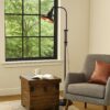 47 Inch Adjustable Metal Floor Lamp and Tapered Shade, Black