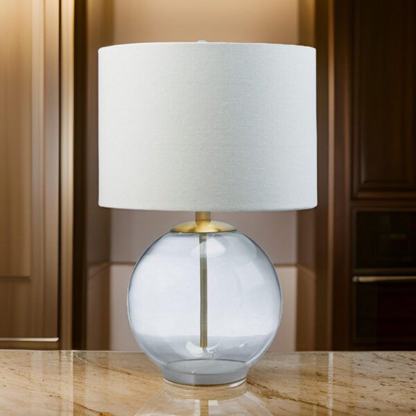21 Inch Table Lamp, White Drum Shade, Round Clear Glass Base, Brass Metal