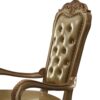 1502202669913fc2cd0d5.jpeg Leatherette Upholstered Arm Chair with Intricate Carvings, Set of 2, Gold