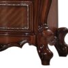 1502202669914f4640f1c.jpeg 2 Drawer Wooden Nightstand with Metal Knobs and Carved Details, Brown