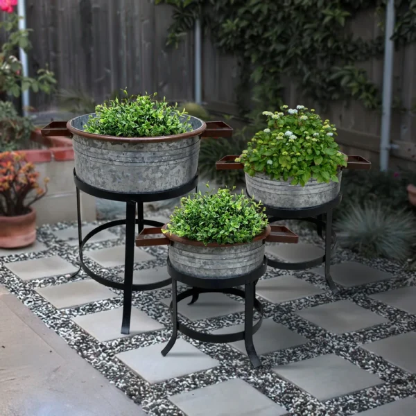 UPT-271316_13_13402f98-510c-4933-930b-50a4ed0e6996 21, 18, and 16 Inch 3 Piece Round Tub Metal Planter Set with Stand in Galvanized Gray and Black Iron