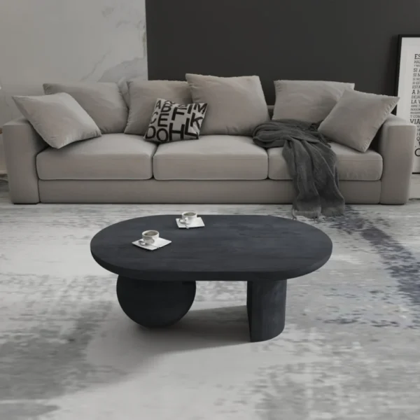Uri 38 Inch Oval Coffee Table, Mango Wood Full and Half Spherical Leg, Sandblasted Black