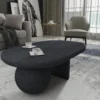 Uri 38 Inch Oval Coffee Table, Mango Wood Full and Half Spherical Leg, Sandblasted Black