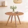 Temi Dining Table | 47" Round Top | Handmade Natural Brown Mango Wood | Angled Four Legged Base