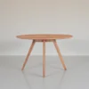 Temi Dining Table | 47" Round Top | Handmade Natural Brown Mango Wood | Angled Four Legged Base
